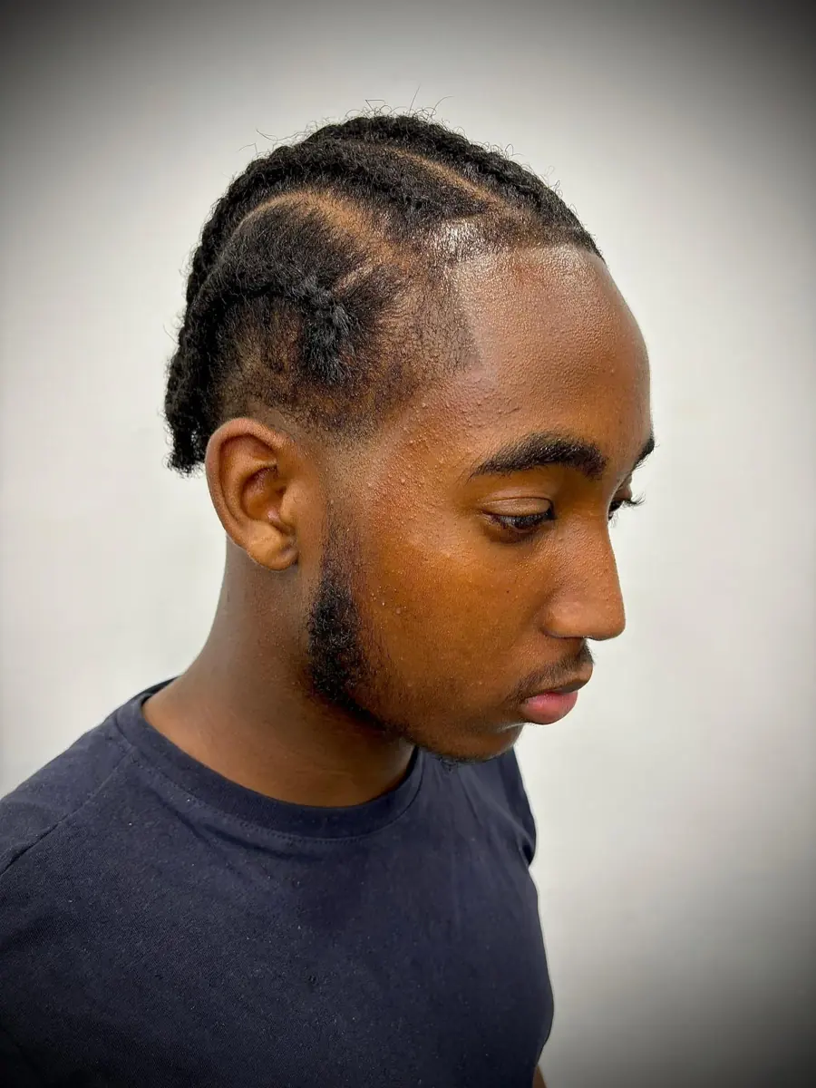 Neat cornrows with a sharp hairline
