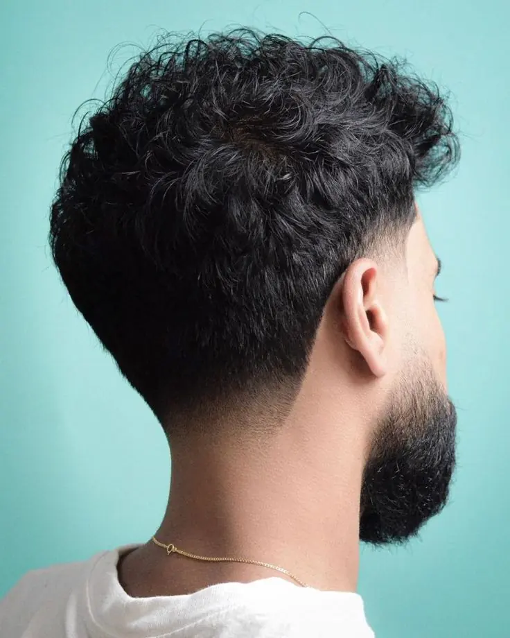 Textured top with beard and fade