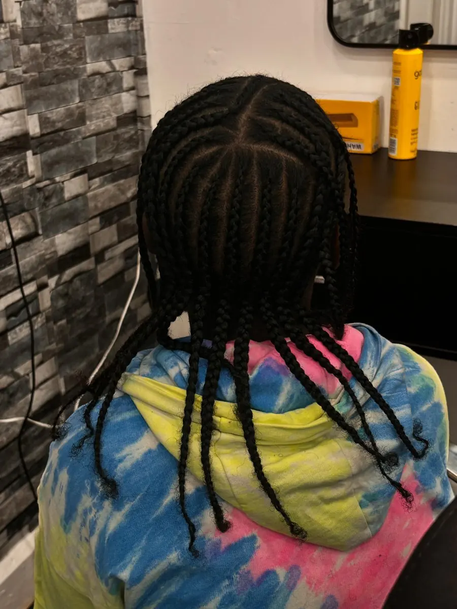 Long single braids on a child